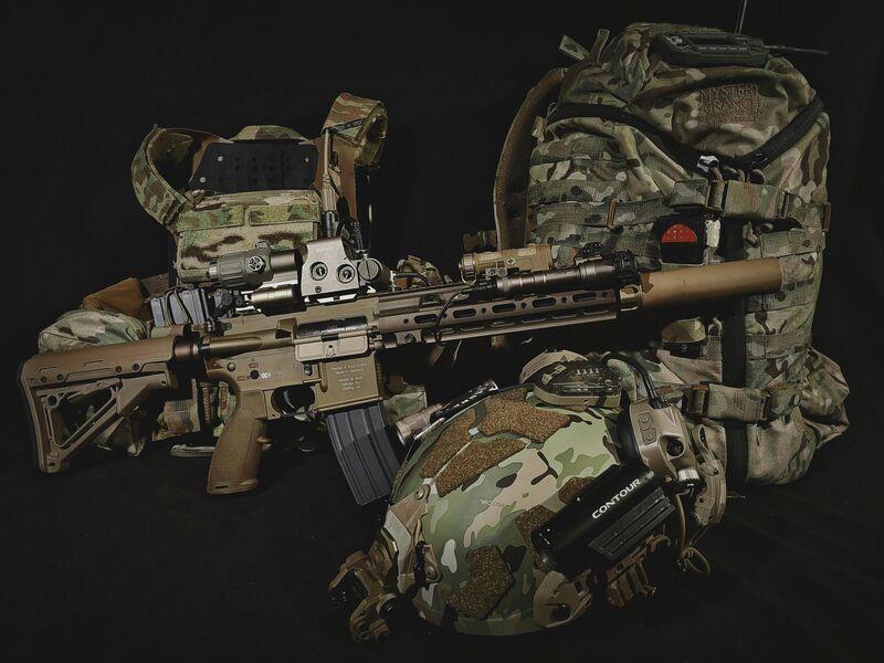 Tactical rifle with full loadout and gear