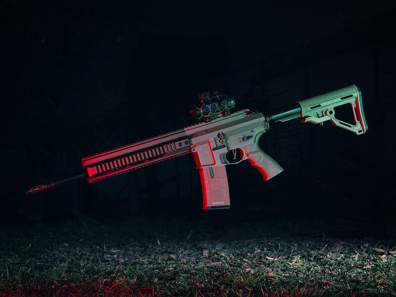Custom AR-15 with dramatic red and green lighting